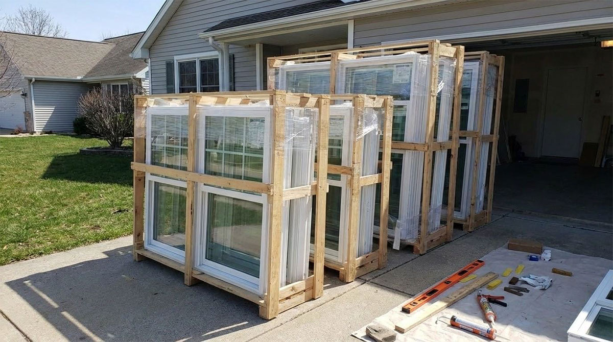 Brand new replacement windows staged for installation