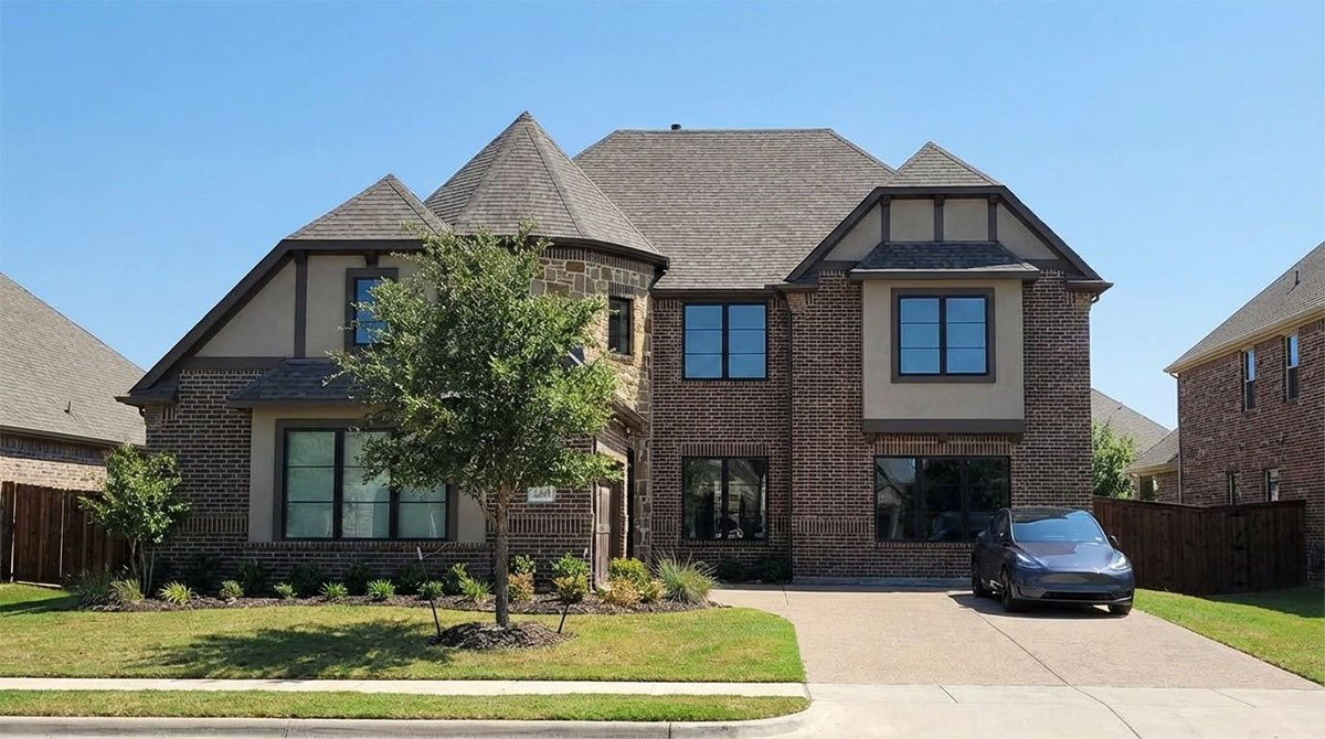 Homeowner reviewing window replacement options with a professional inside a home
